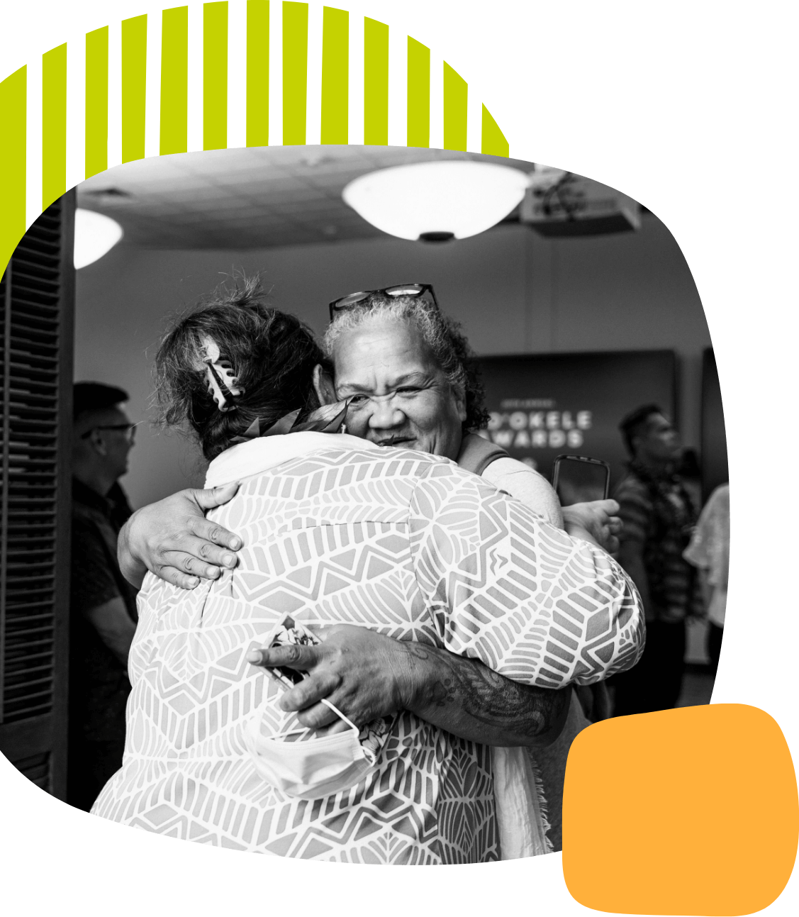 Two women sharing a big hug.